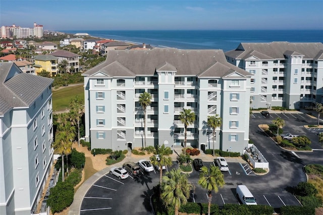 bird's eye view with a water view