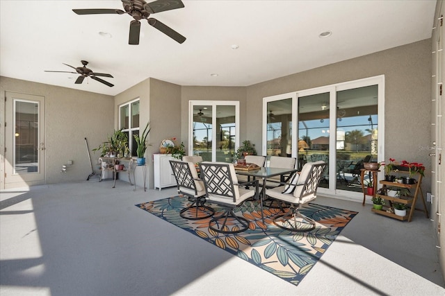 view of patio featuring ceiling fan