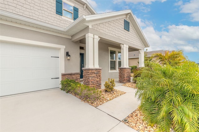 entrance to property featuring a garage