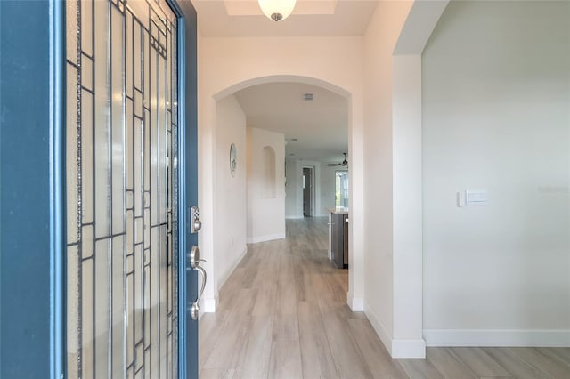 entryway featuring ceiling fan and light wood-type flooring