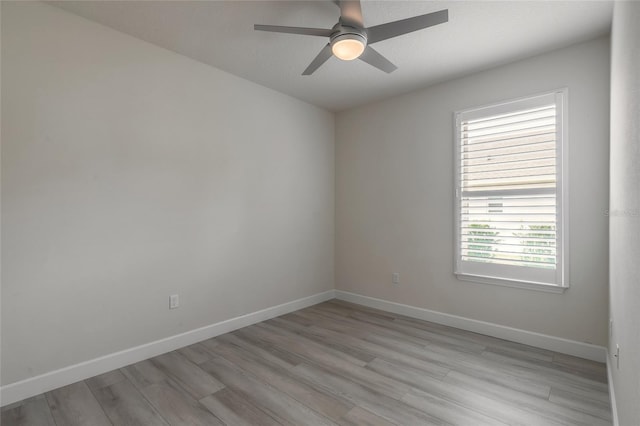 spare room with ceiling fan and light hardwood / wood-style floors