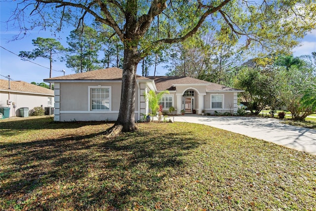 view of front of home with a front lawn