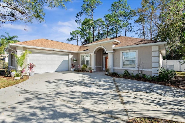 view of front of home with a garage