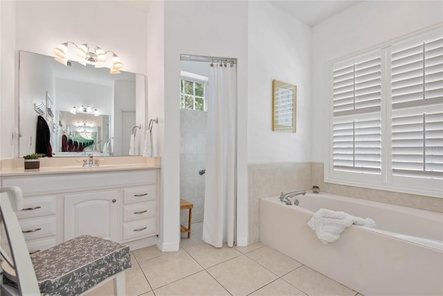 bathroom featuring tile patterned flooring, vanity, and independent shower and bath