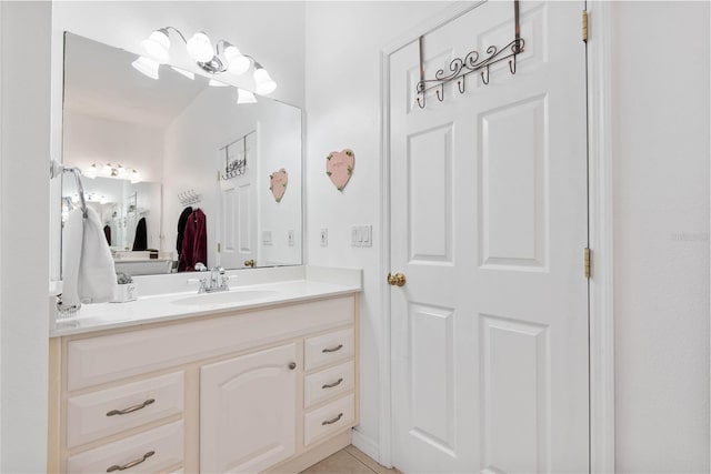 bathroom featuring vanity and tile patterned floors