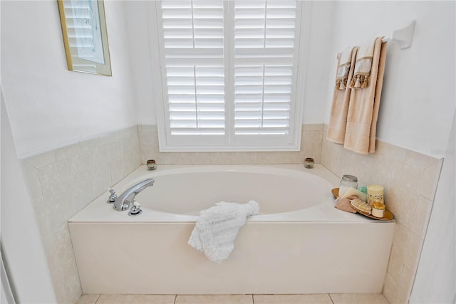 bathroom with a tub to relax in