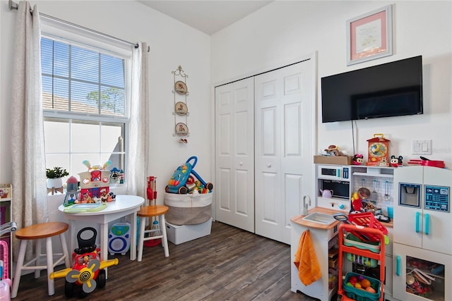 game room featuring dark hardwood / wood-style floors