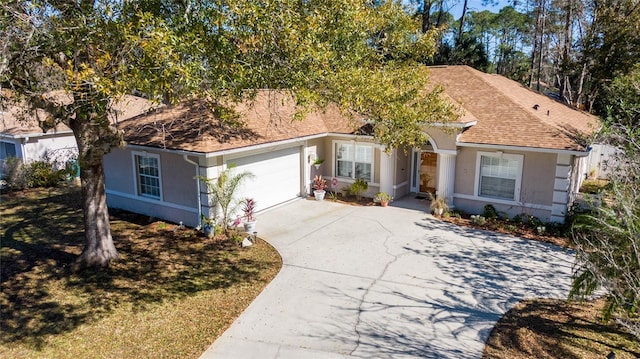 single story home with a garage