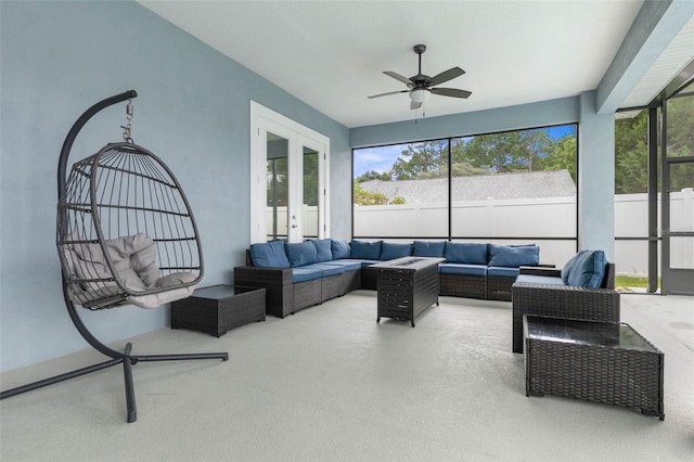 sunroom with french doors and ceiling fan