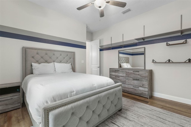 bedroom featuring wood-type flooring and ceiling fan