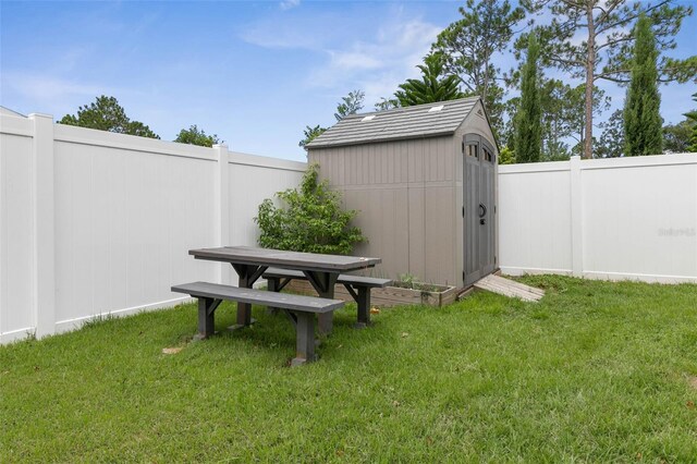 view of outdoor structure featuring a yard