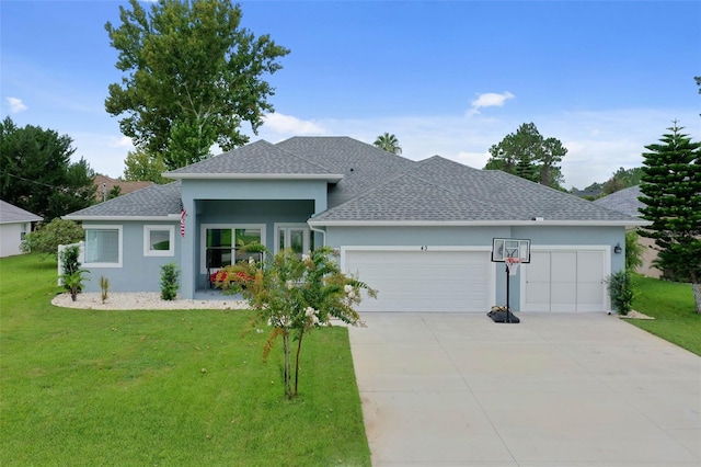 view of front facade featuring a garage and a front yard