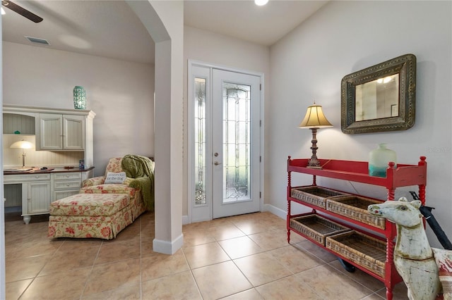 foyer featuring light tile patterned flooring