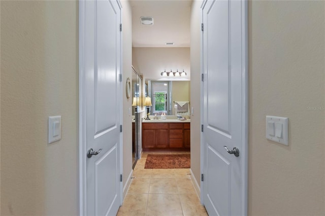 bathroom featuring vanity and tile patterned floors