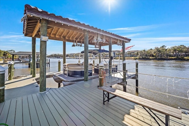 dock area with a water view