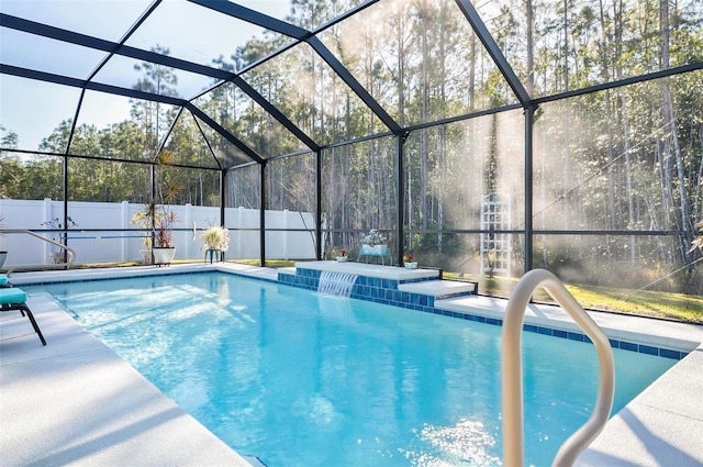 view of pool featuring a lanai and pool water feature