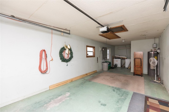 garage with a garage door opener and electric water heater