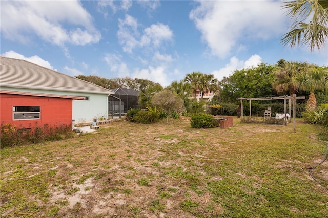 view of yard featuring a lanai