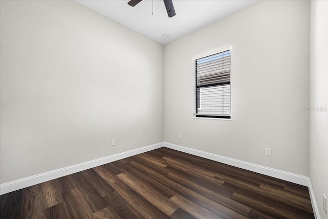 unfurnished room featuring ceiling fan and dark hardwood / wood-style flooring