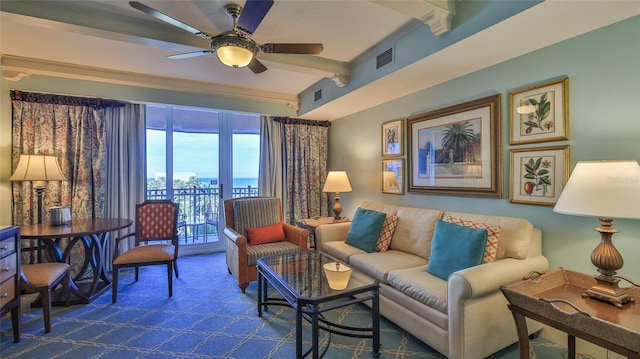 living area featuring visible vents, a ceiling fan, dark carpet, and beamed ceiling