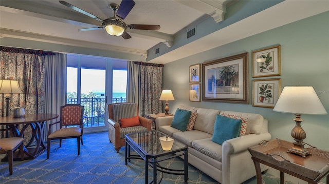 carpeted living area featuring visible vents, beamed ceiling, and a ceiling fan