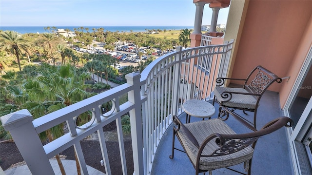 balcony featuring a water view