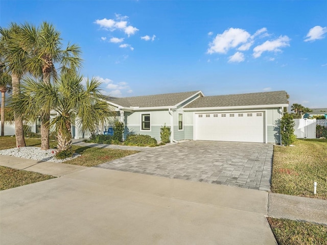 ranch-style house featuring a garage