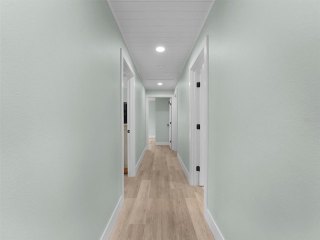 hallway with light wood-type flooring