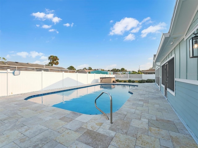 view of pool with a patio