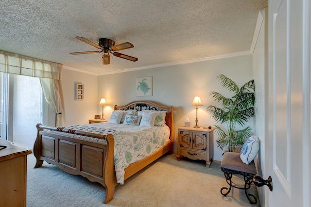 bedroom featuring crown molding, light colored carpet, and a textured ceiling