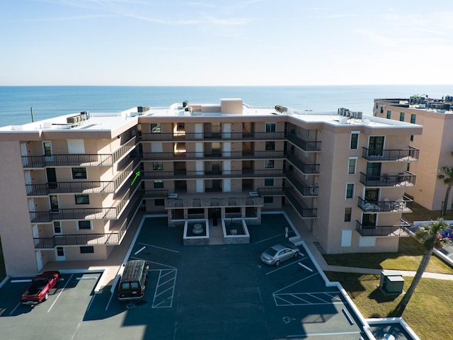 view of building exterior with a water view