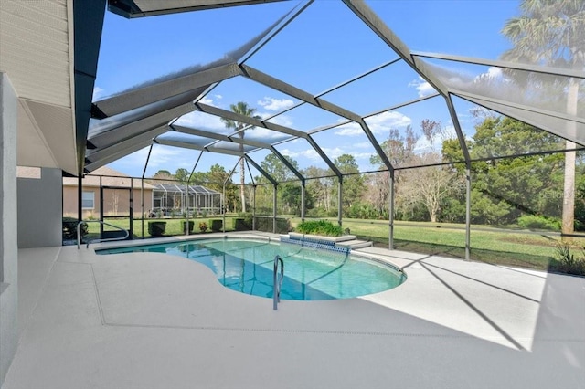 view of pool with a lanai, a patio, and a lawn