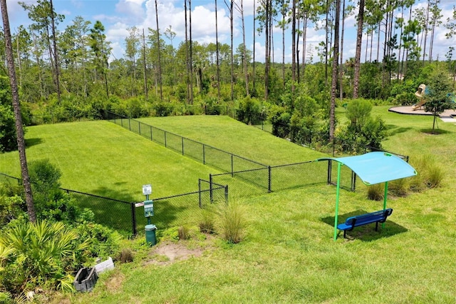 view of home's community with a lawn