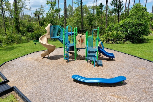 view of playground featuring a yard