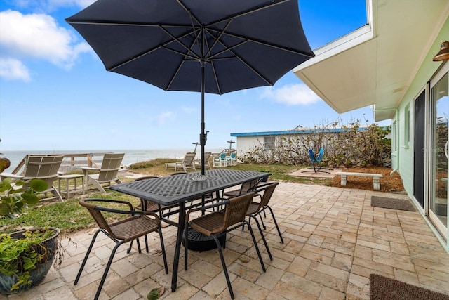 view of patio / terrace with a water view