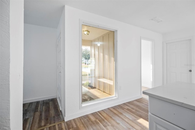 interior space with hardwood / wood-style floors