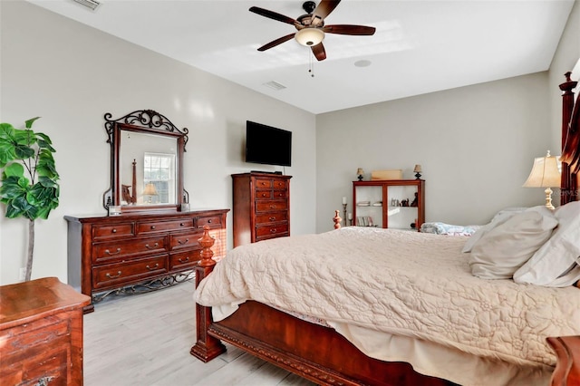 bedroom featuring ceiling fan and light hardwood / wood-style floors