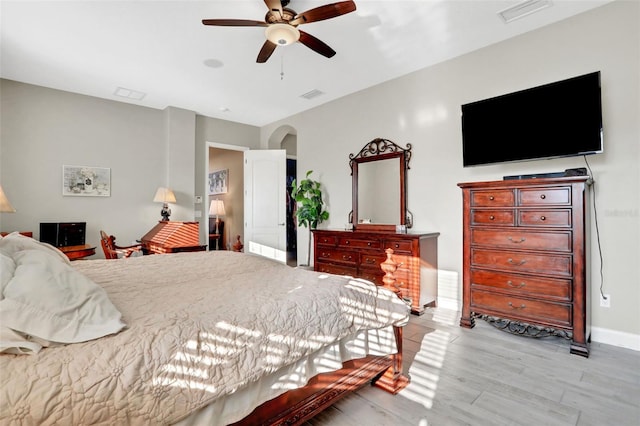 bedroom featuring light hardwood / wood-style flooring and ceiling fan