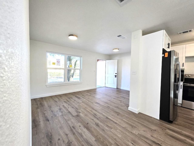 interior space with hardwood / wood-style flooring