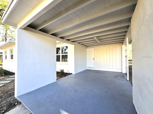 view of patio / terrace with a carport