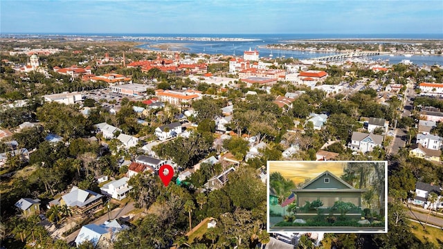 bird's eye view with a water view