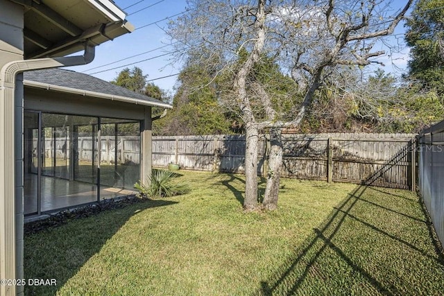 view of yard featuring a sunroom