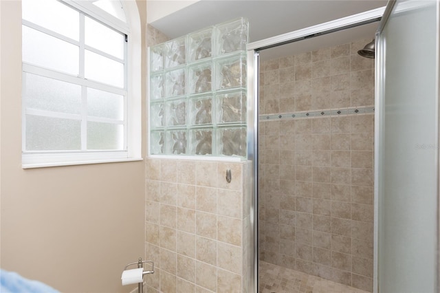 bathroom featuring an enclosed shower