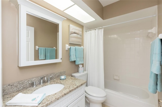 full bathroom featuring vanity, toilet, and shower / bath combo with shower curtain