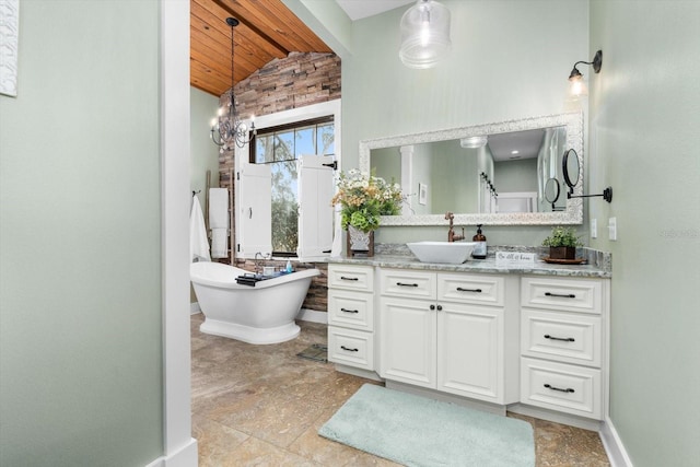 bathroom featuring lofted ceiling, vanity, a notable chandelier, wood ceiling, and a bath