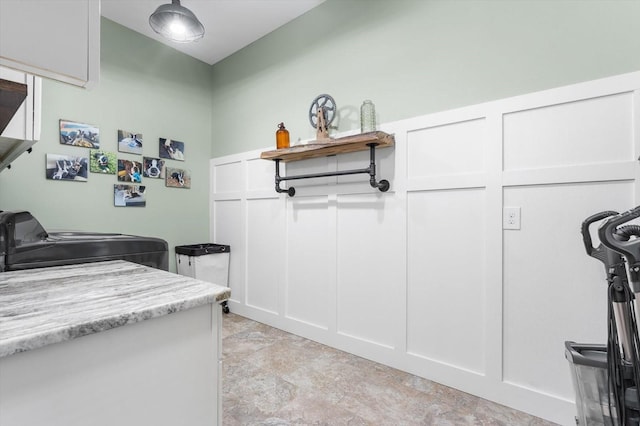 laundry area with separate washer and dryer