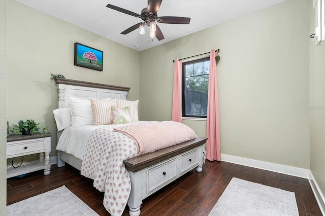 bedroom with ceiling fan and dark hardwood / wood-style flooring