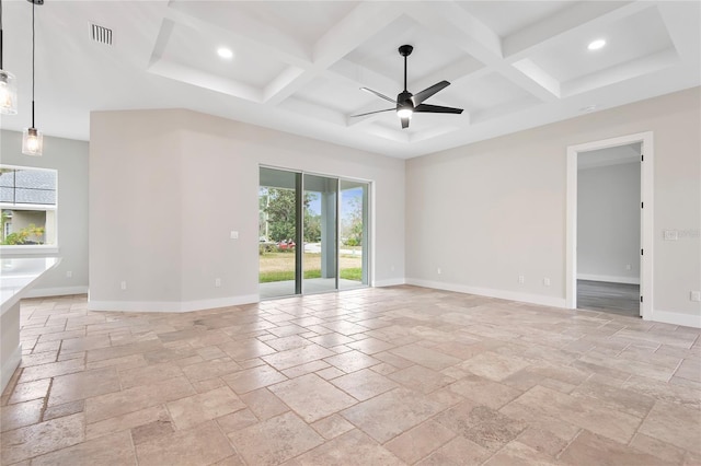 spare room with beamed ceiling, ceiling fan, coffered ceiling, and a high ceiling