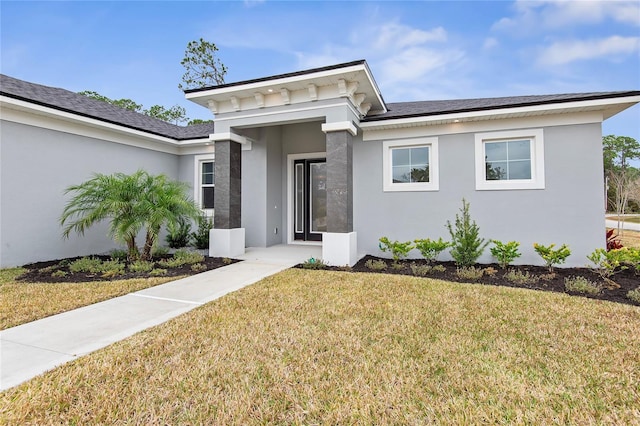 view of front facade with a front yard