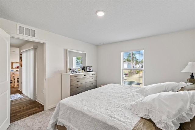 bedroom with a textured ceiling